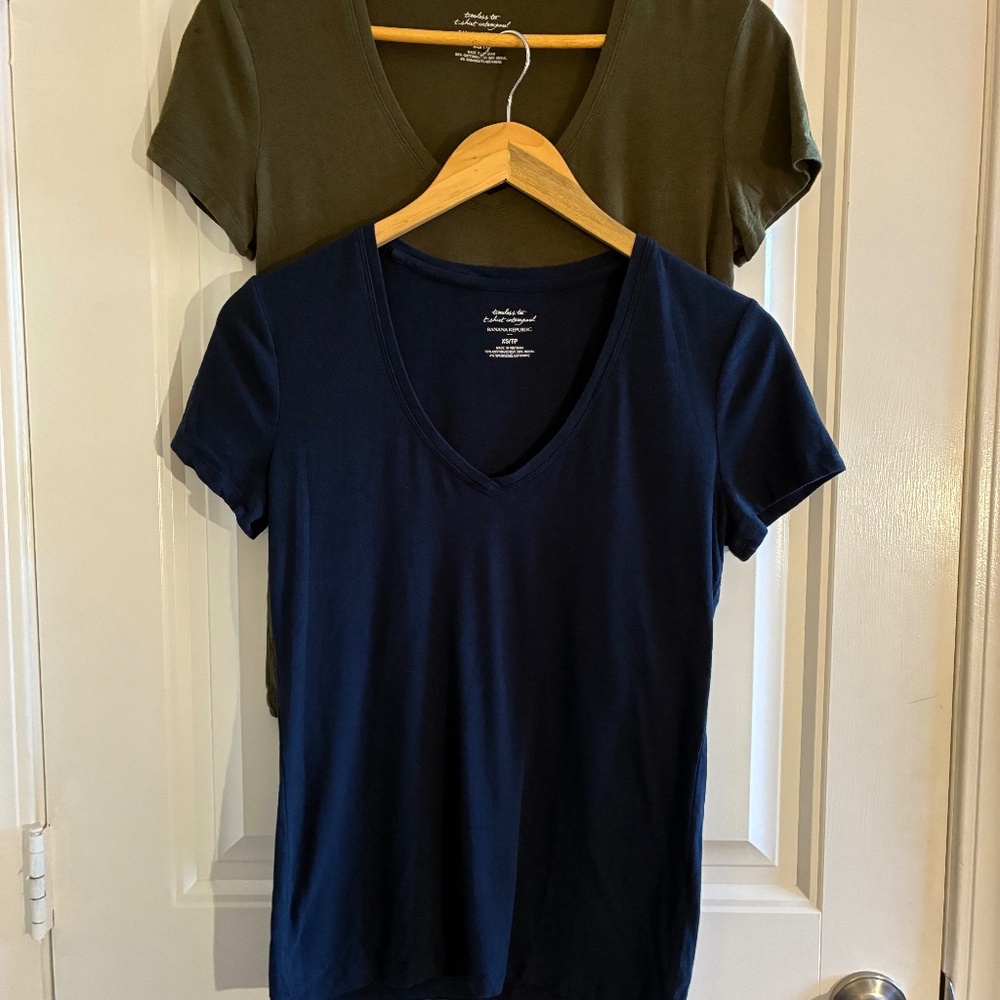Two for $10 Banana Republic t-shirts. Olive Green and Navy Blue size XS
